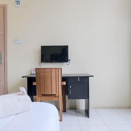 Urbanview Hotel Ta Ke Jelutung Puncak Джамби Экстерьер фото